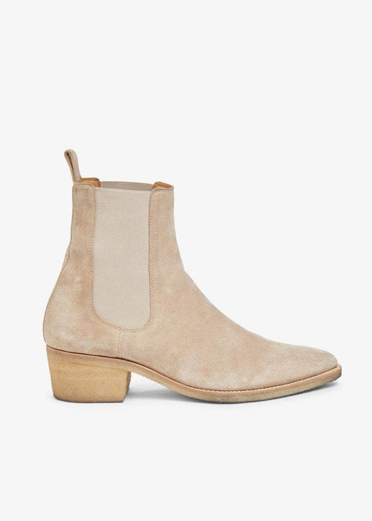 Beige Chelsea boot on a white background